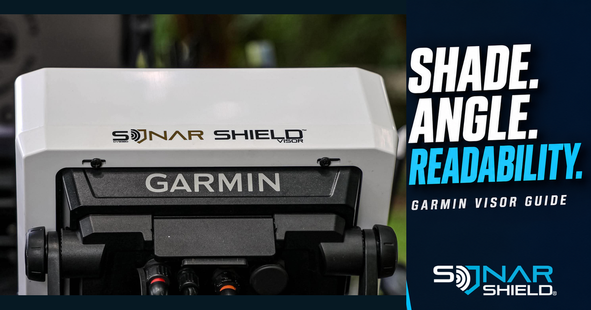 Real close-up of a white Sonar Shield bolt-on visor installed on a Garmin display, showing the rear mounting hardware and branding.