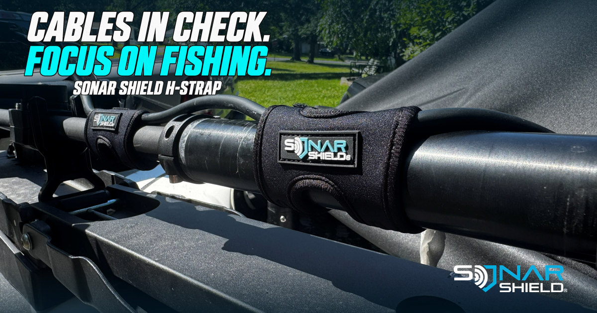 Two Sonar Shield H-Straps installed around a trolling motor housing supporting a sonar cable